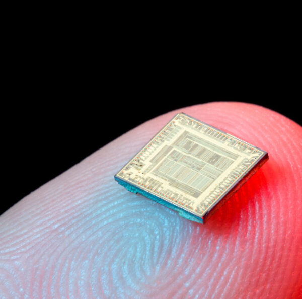 Silicon microchip on fingertip