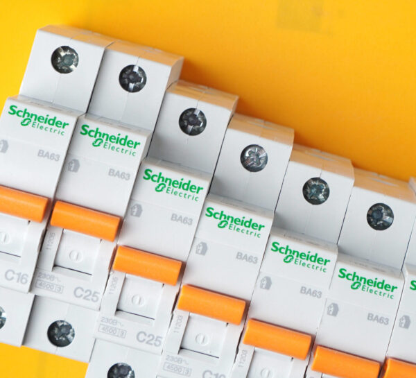 KHARKIV, UKRAINE – 2 September, 2020: Schneider Electric circuit breakers. Schneider Electric – is a world famous company is a leading developer and supplier of integrated energy efficient solutions.